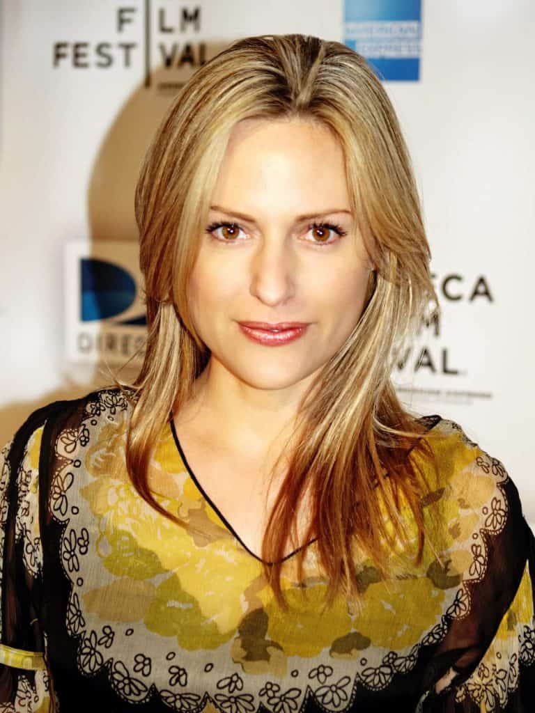 Aimee Mullins at the 2009 Tribeca Film Festival wearing a yellow dress.