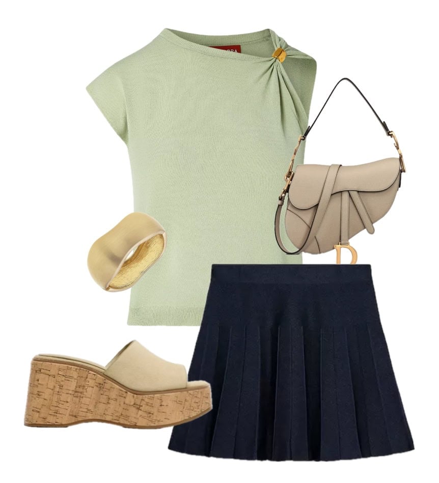 Light green top, navy pleated skirt, beige handbag, and cream platform sandals with gold bracelet.