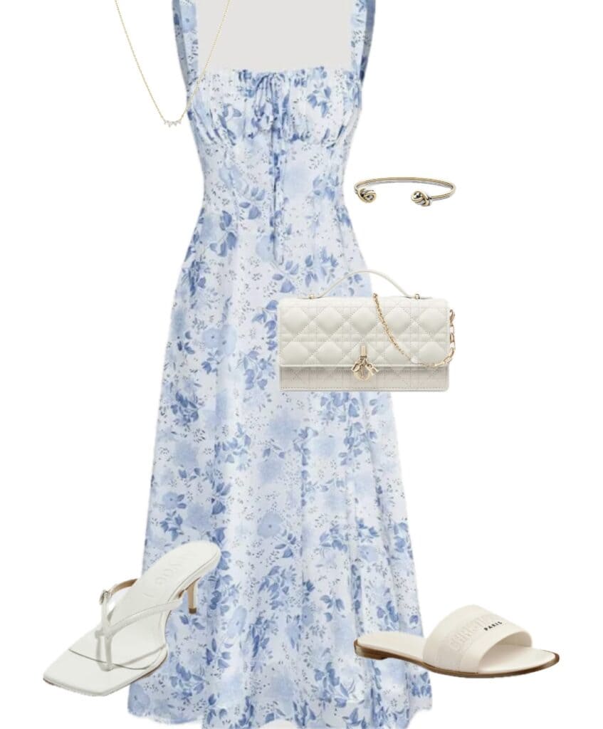 A blue and white floral dress paired with a white clutch and sandals, showcasing a stylish summer outfit.